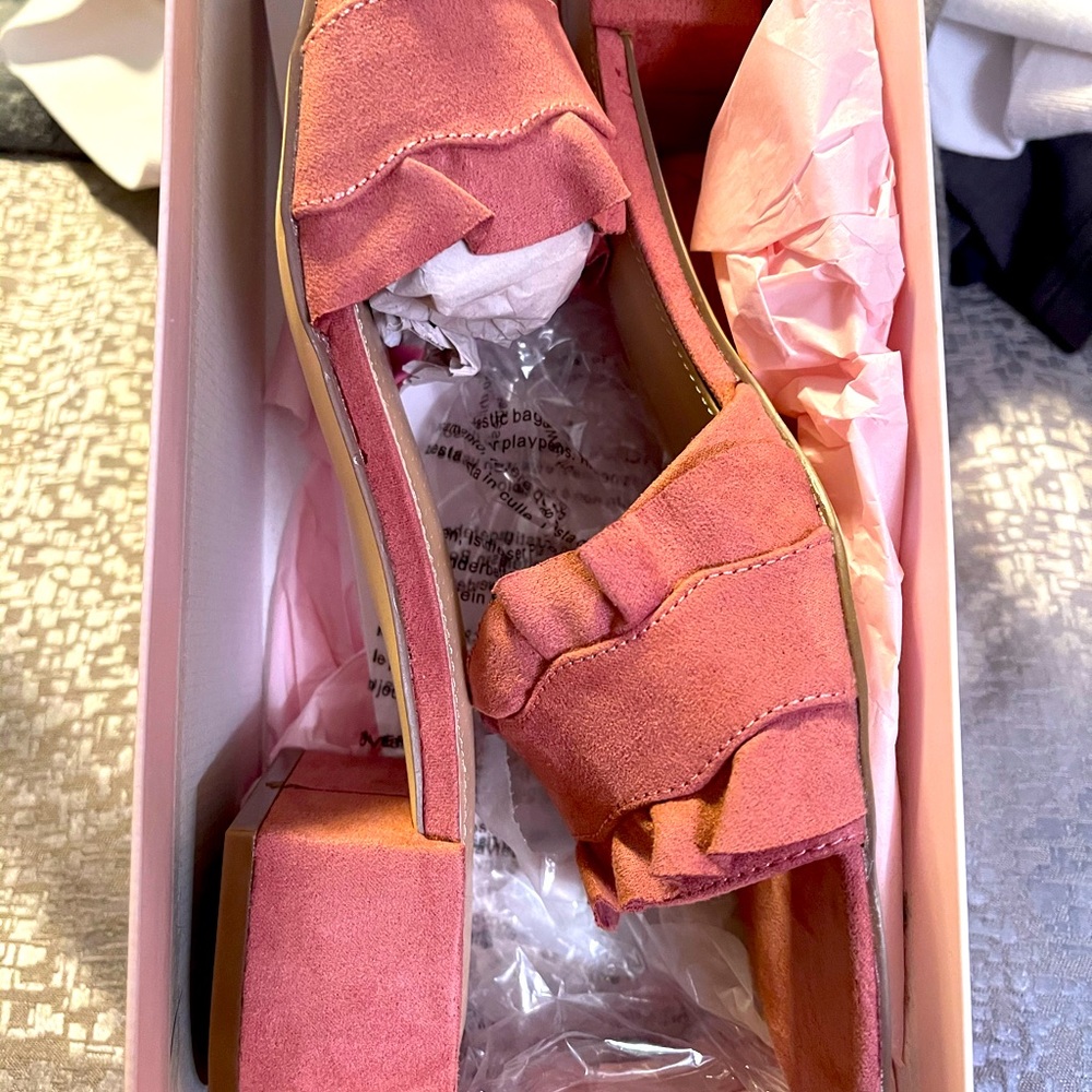 Rose pink suede slides.